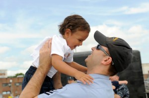 US_Navy_090722-N-8467N-006_Culinary_Specialist_1st_Class_Joseph_Appold_hugs_his_1-year-old_son_Kameron_upon_the_return_of_the_Virginia-class_attack_submarine_USS_New_Hampshire_(SSN_778)_to_Submarine_Base_New_London